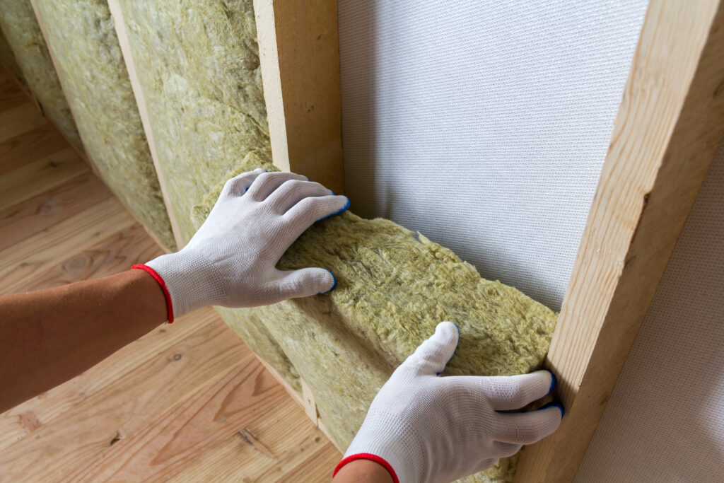 worker-hands-insulating